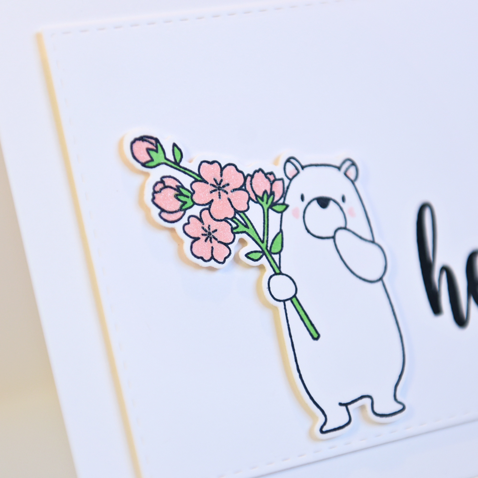 polar bear with pink flowers